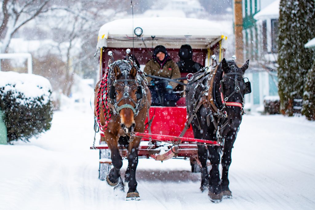 Mackinac Island horse-drawn taxis and snowmobiles are common forms of transportation during the winter offseason.