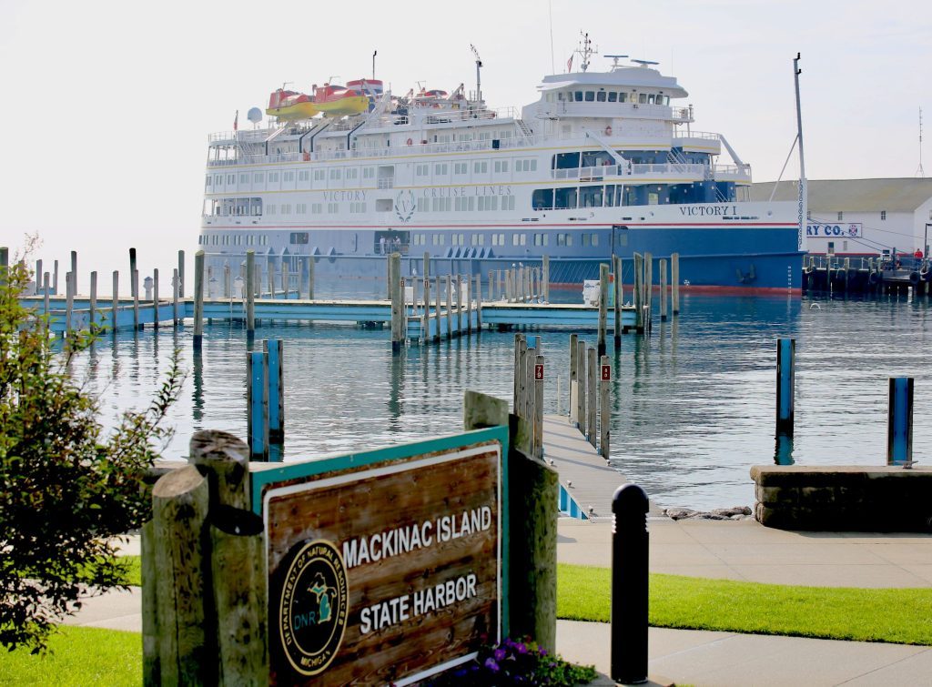 A large cruise ship docks in Mackinac Island State Harbor 