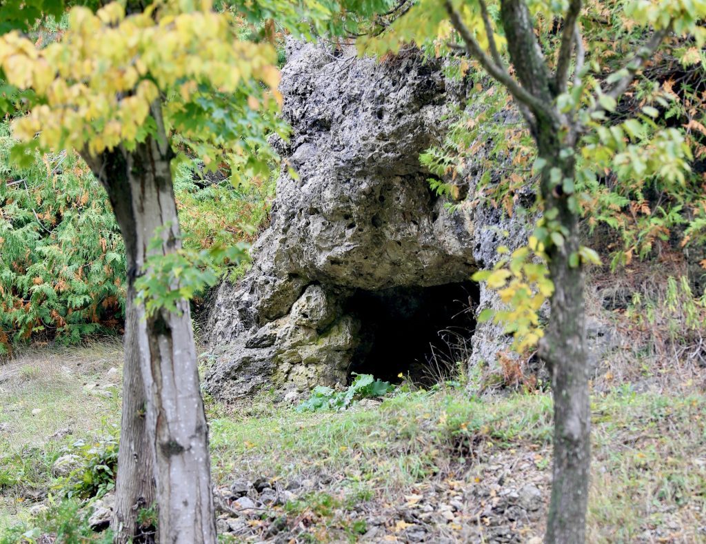 The small opening to Skull Cave in Mackinac Island State Park