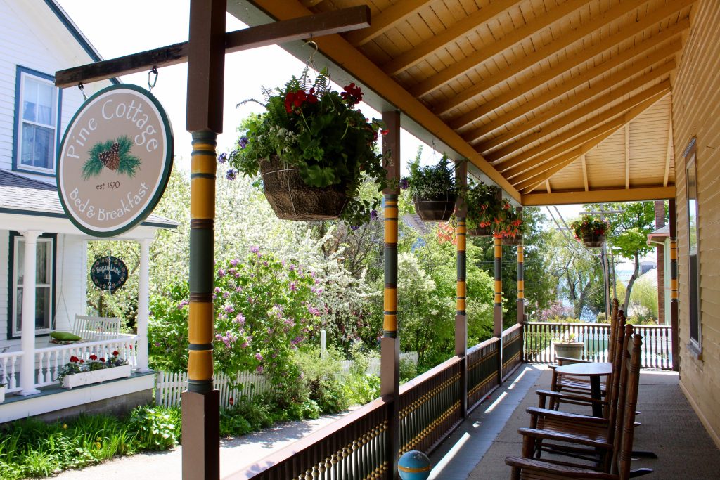 Bogan Lane Inn sits across the street from the wraparound porch out front of Pine Cottage B&B on Mackinac Island