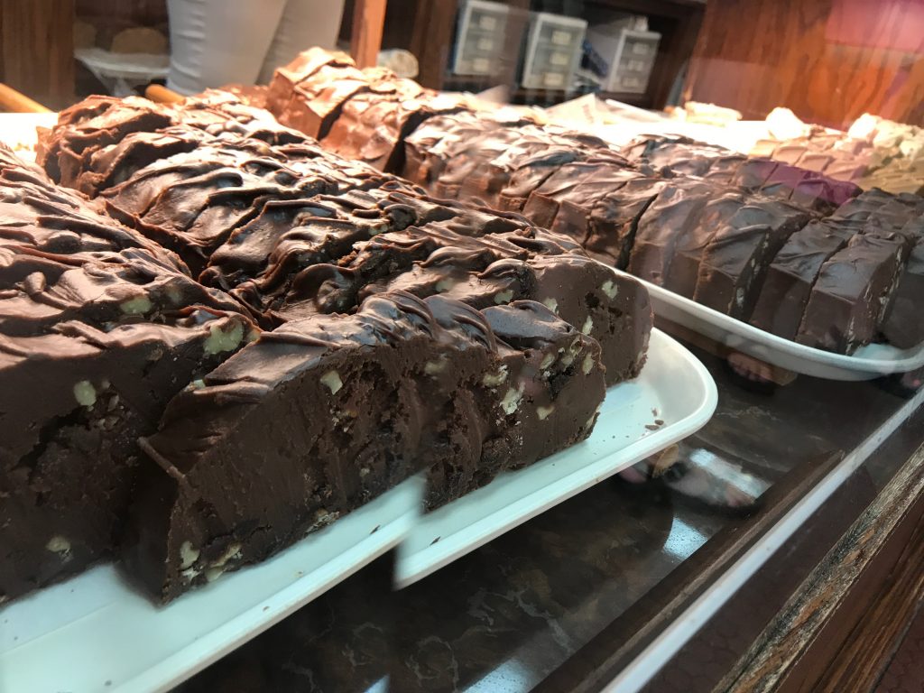 Selection of Chocolate Fudge with Nuts in Display Case at Shop on Mackinac Island