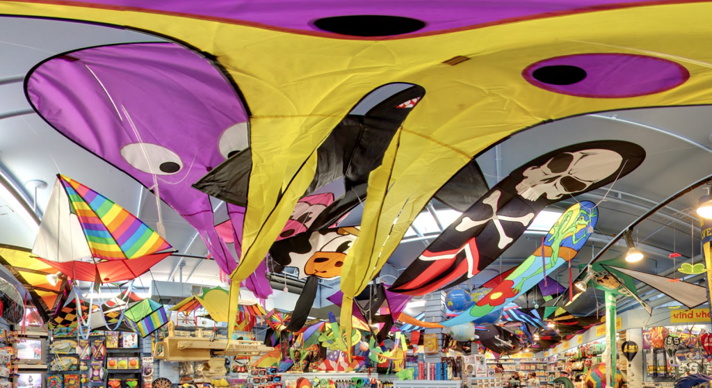 Colorful kites cover the ceiling of a toy store in downtown Mackinac Island
