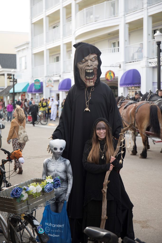 Mackinac Island visitors dressed at ghouls for Halloween Weekend trick or treating