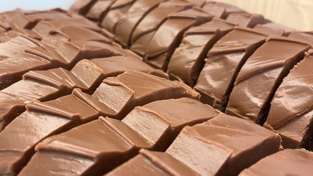 Creamy loaf of world-famous Mackinac Island fudge sliced into pieces