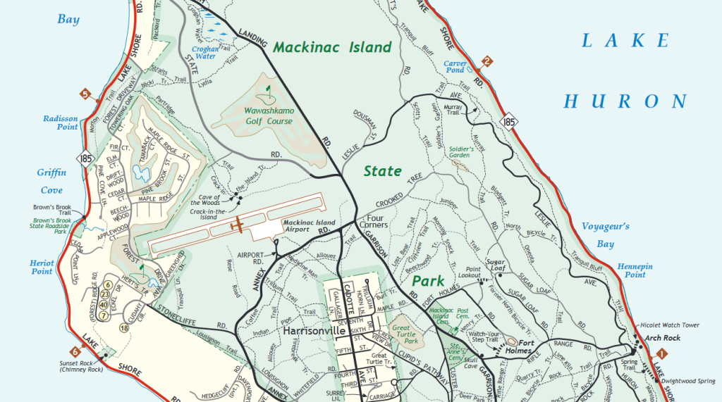 Excerpt of a map of Michigan’s Mackinac Island showing roads, trails and landmarks including Arch Rock and Sugar Loaf