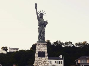 An 8-foot tall replica of the Statue of Liberty stands at the marina on Mackinac Island