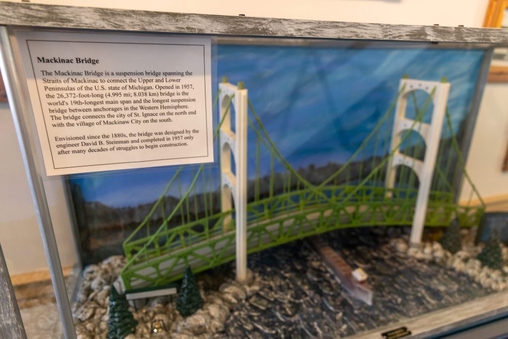 A scaled replica of the Mackinac Bridge is on display in Mackinac Island's Stuart House City Museum