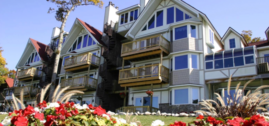 Lakebluff Condos & Suites sits atop Mackinac Island's West Bluff in the Stonecliffe area overlooking the water