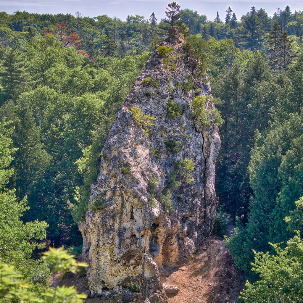 Just like during the Mackinac National Park era, towering Sugar Loaf remains an attraction in the middle of Mackinac Island.