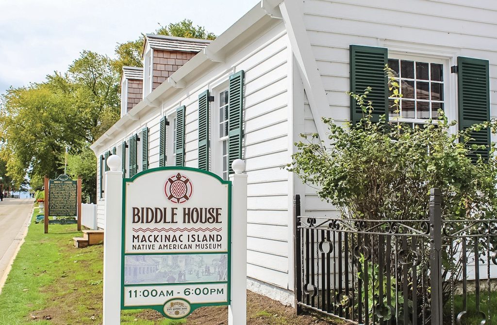 A sign for the Biddle House Mackinac Island Native American Museum