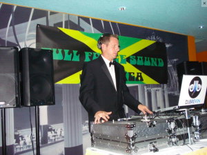 A wedding DJ plays music during a reception on Mackinac Island